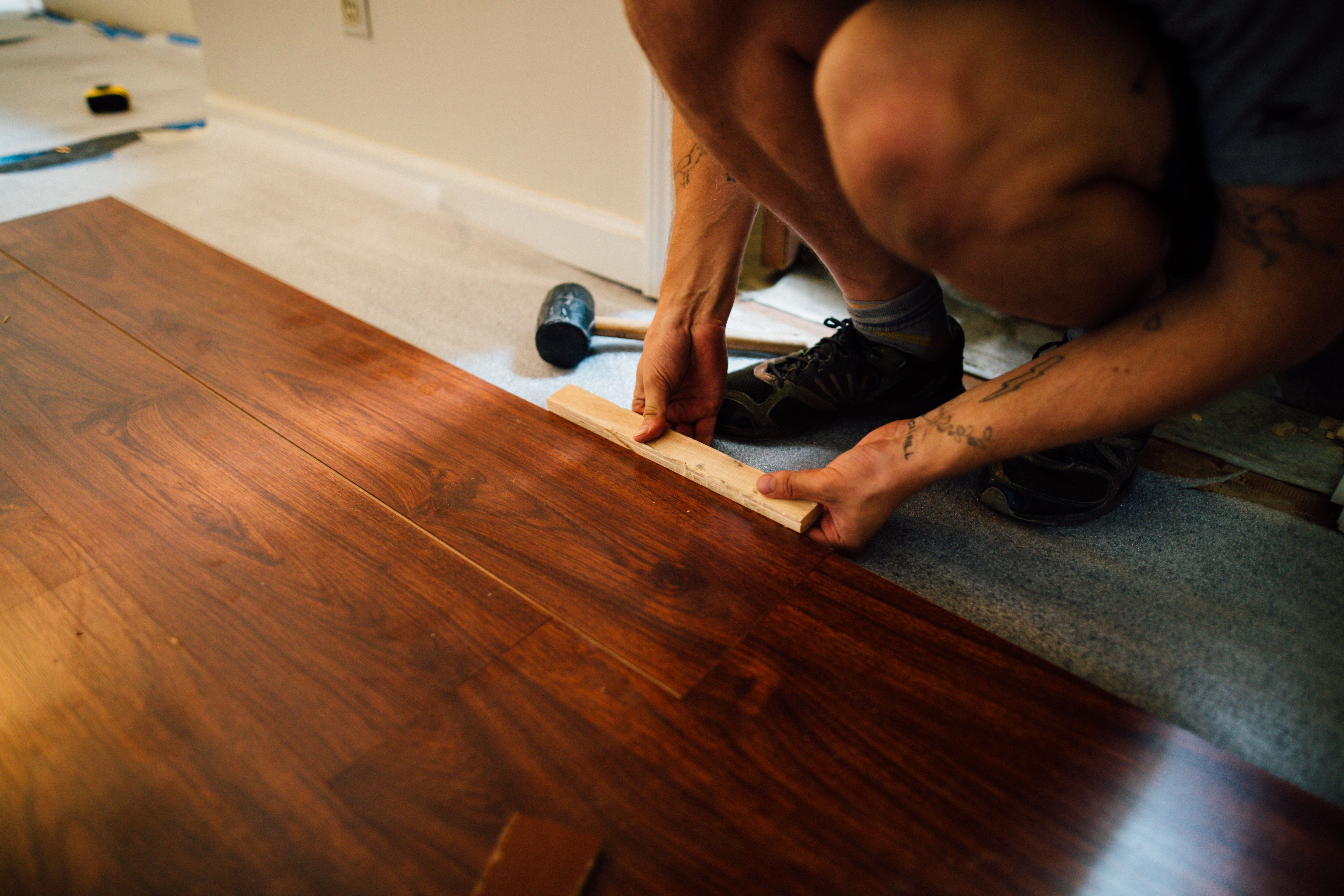Laminate flooring being installed